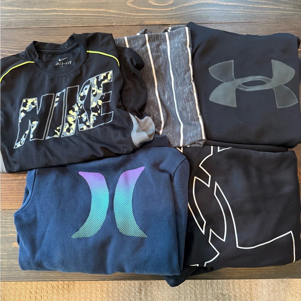 Four boys hoodies. Size 10-12. UA, Hurley Nike